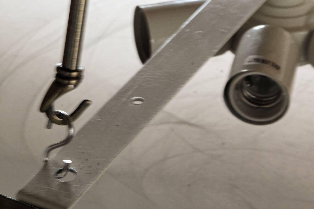 Large suspension art deco style, glass, aged brass finish.