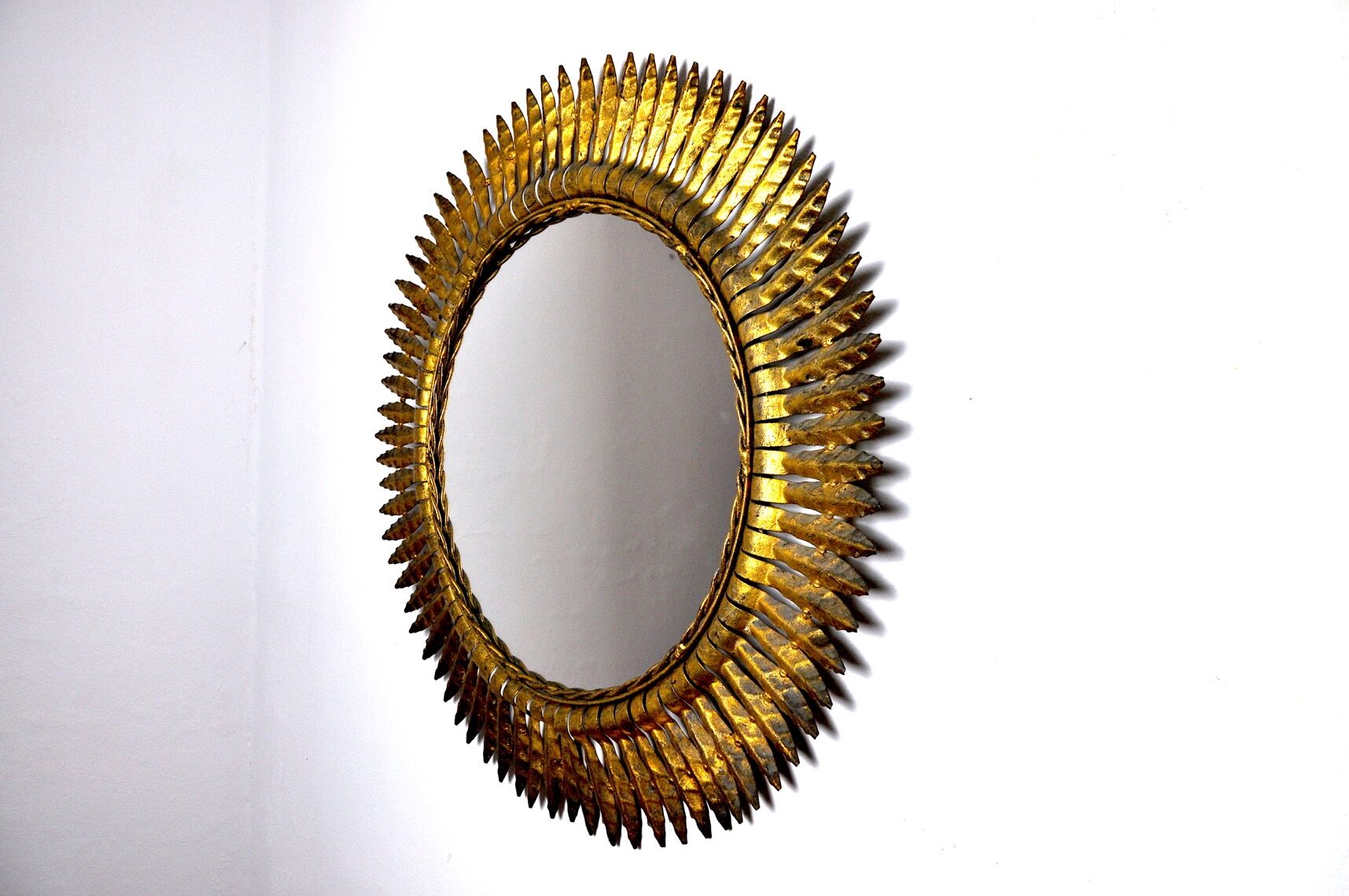 Miroir soleil, gilded metal with gold leaf, Italy, 1960