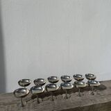 10 stainless steel cups signed Rémy Letang