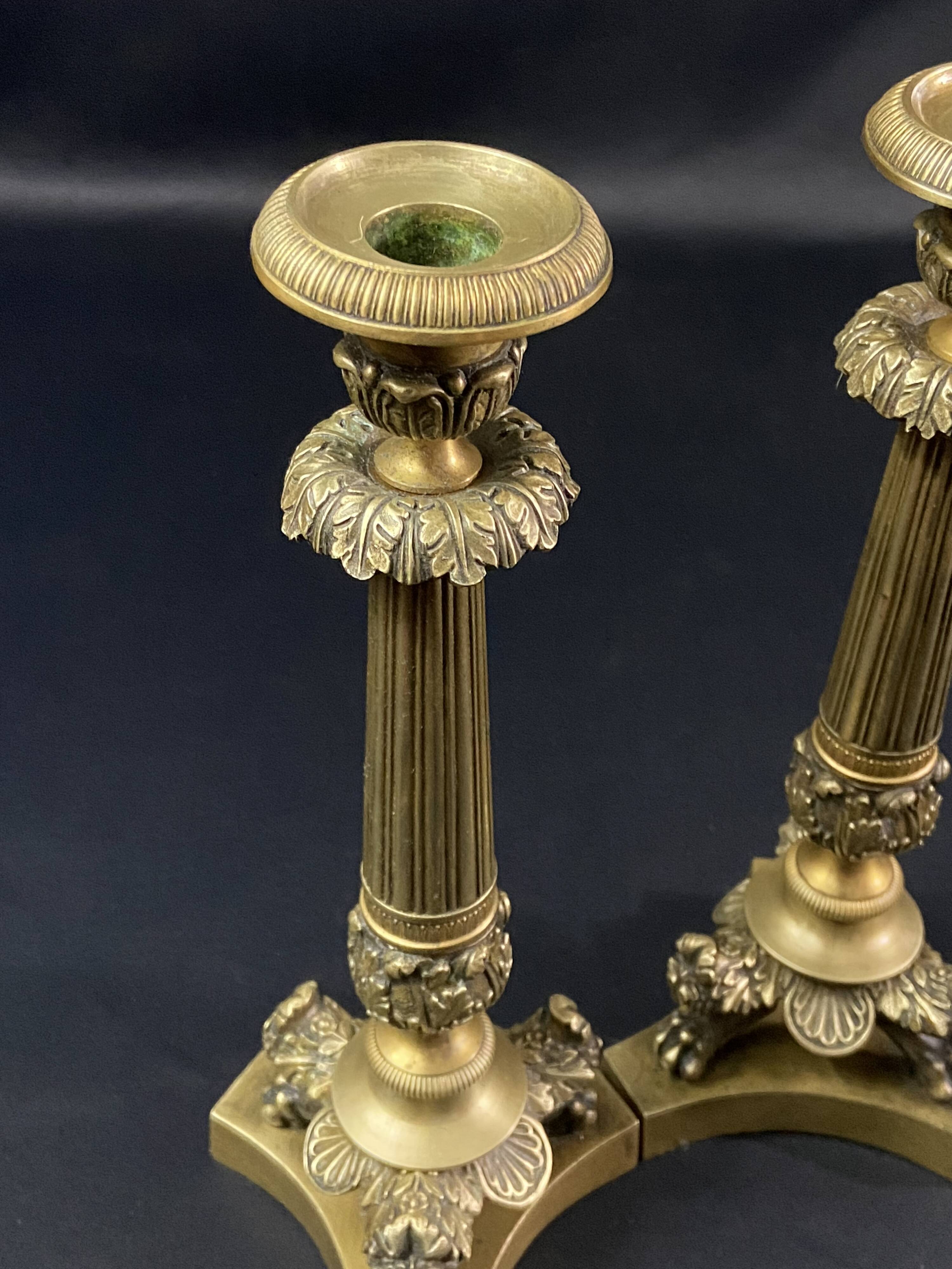 Pair of gilt and chiseled bronze candlesticks from the Restoration period