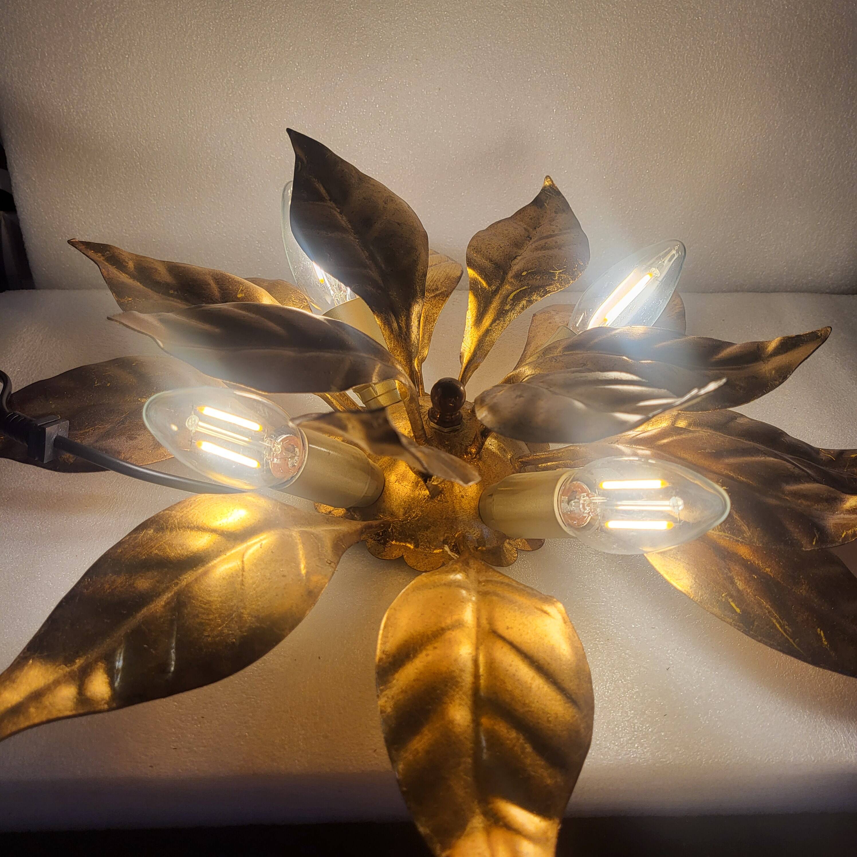 2 gold leaf wall sconces, design by Hans Kogl, Germany, 1960.