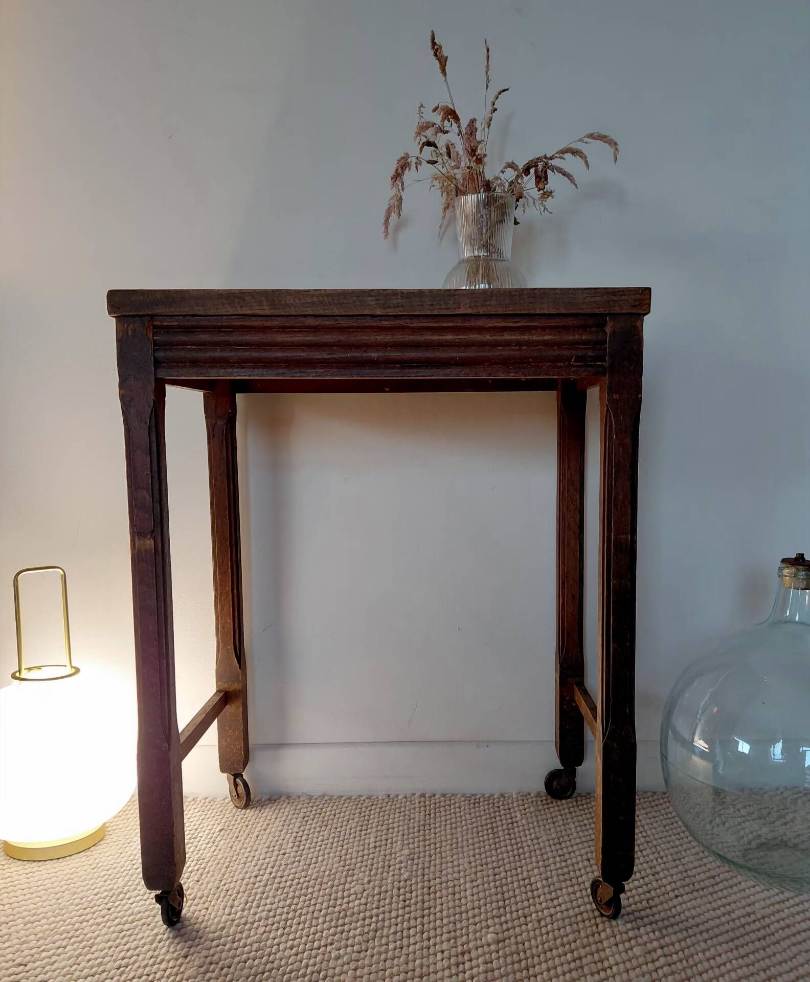 Vintage wooden wheeled side table/console.