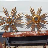 2 wooden sun mirrors and golden plaster