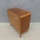 commode vintage en bois pieds compas