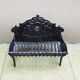 Old gate, cradle with cast iron logs