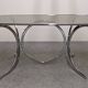 Oval dining table in chromed metal and smoked glass, Italy circa 1970
