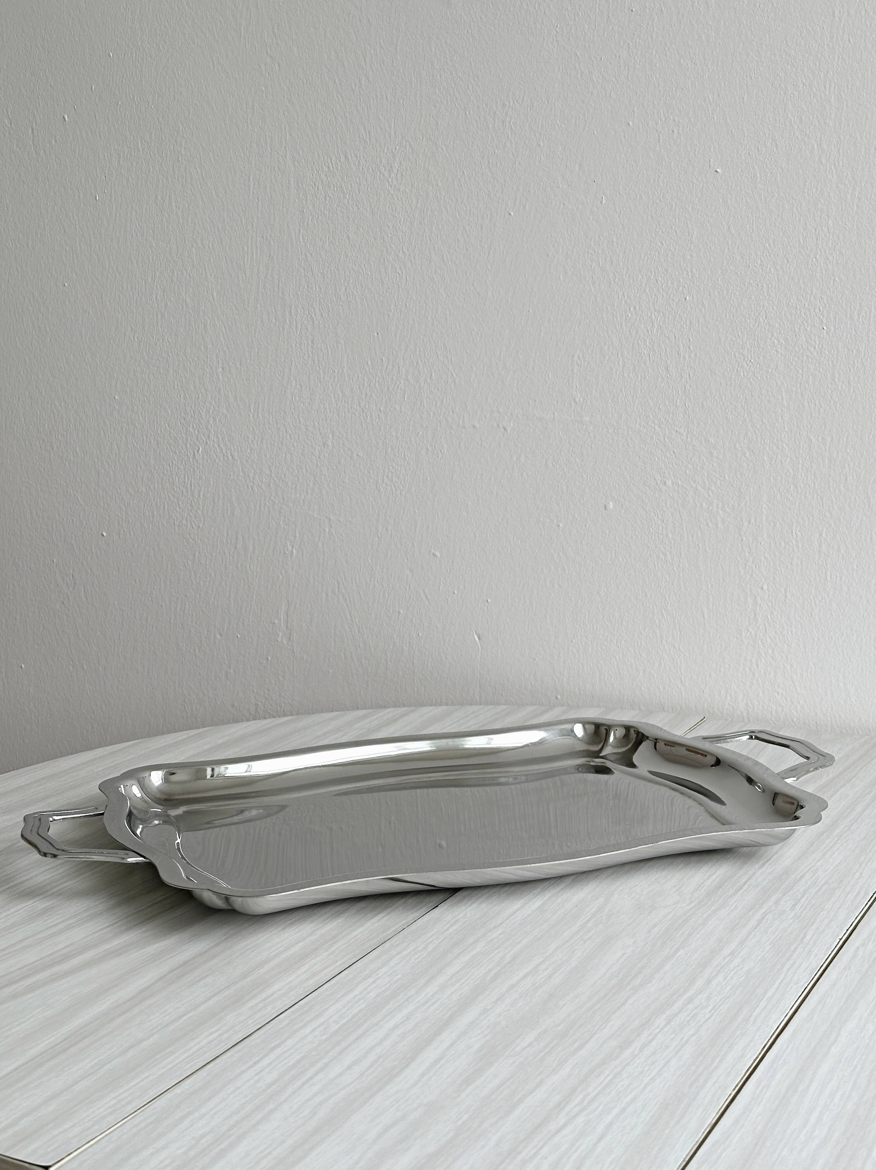 Shiny stainless steel plate.