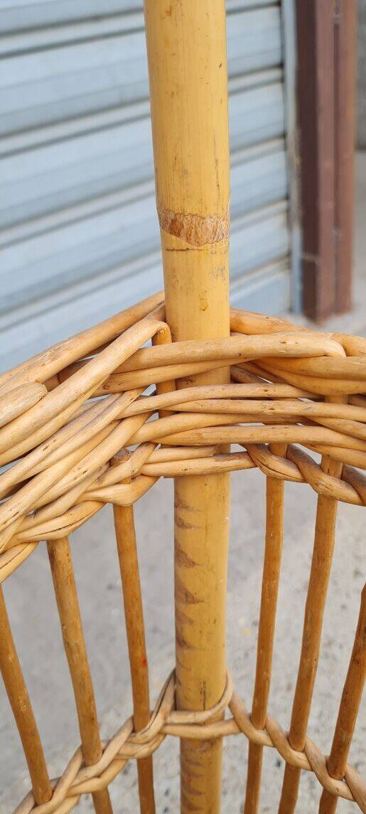 Vintage wicker log basket on vintage wheels