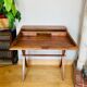Desk, writing desk in solid rosewood and studded leather, 20th century.