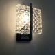 Pair of modernist glass and chrome metal wall sconces. 1960s-70s
