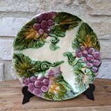 Old barbotine plate with vine motif