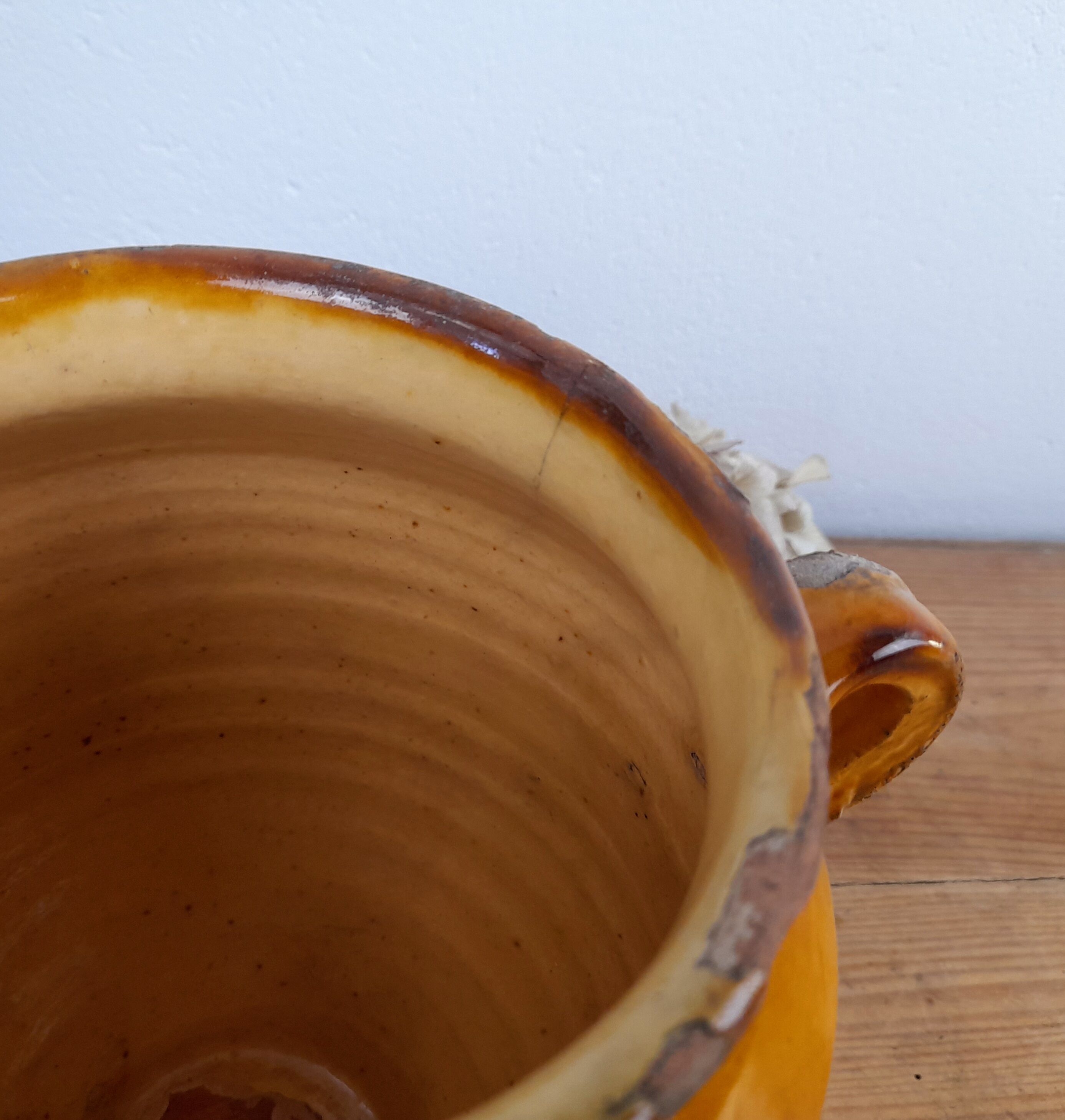 Old glazed terracotta grease pot