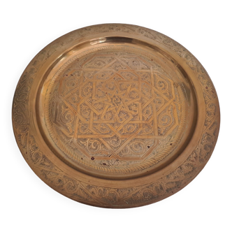 Large chiseled metal plate