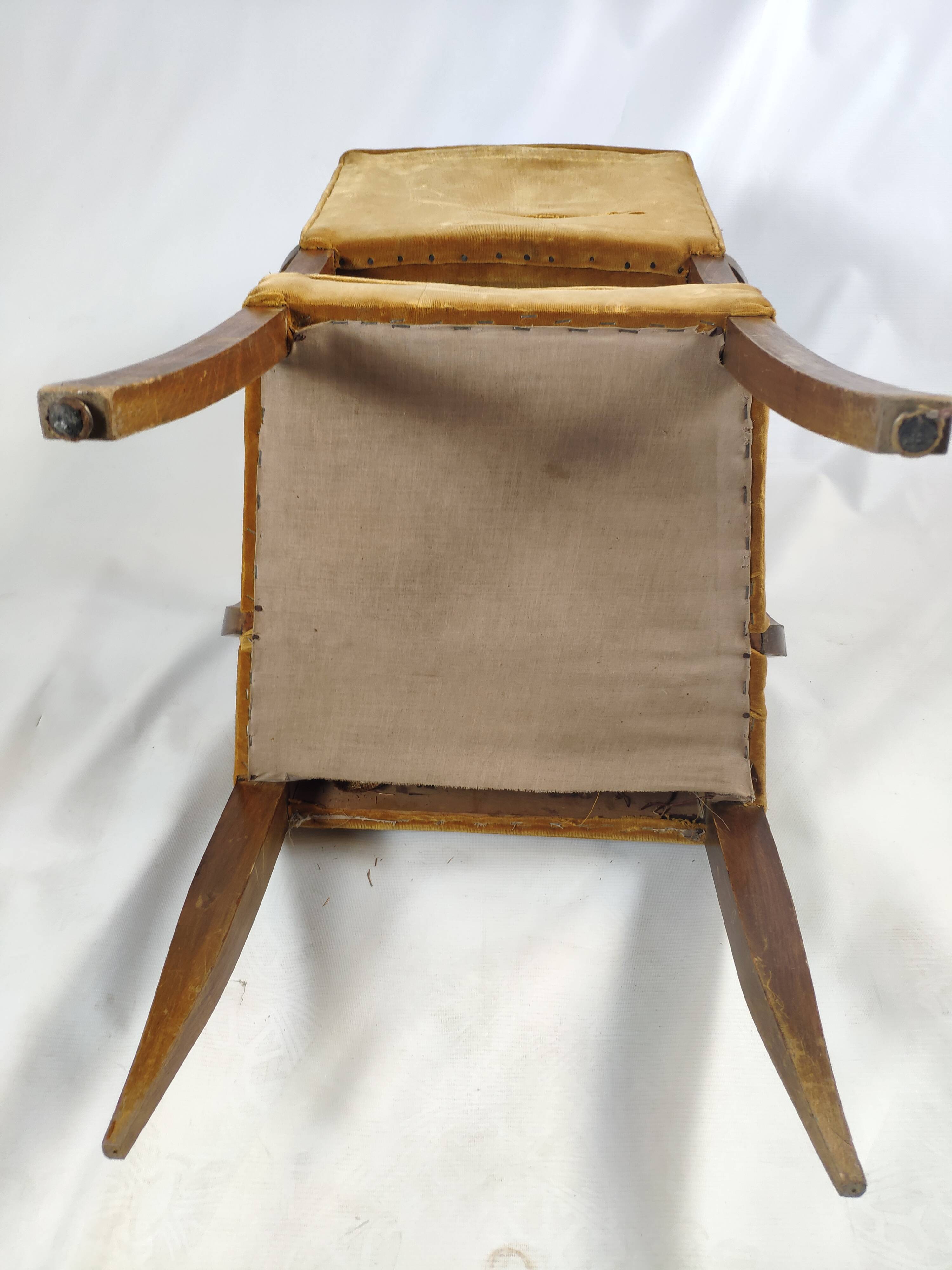 Armchair in mustard yellow velvet