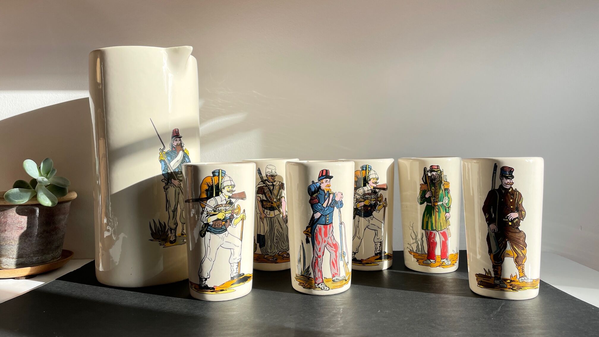 Orangeade service to vintage ceramic soldiers