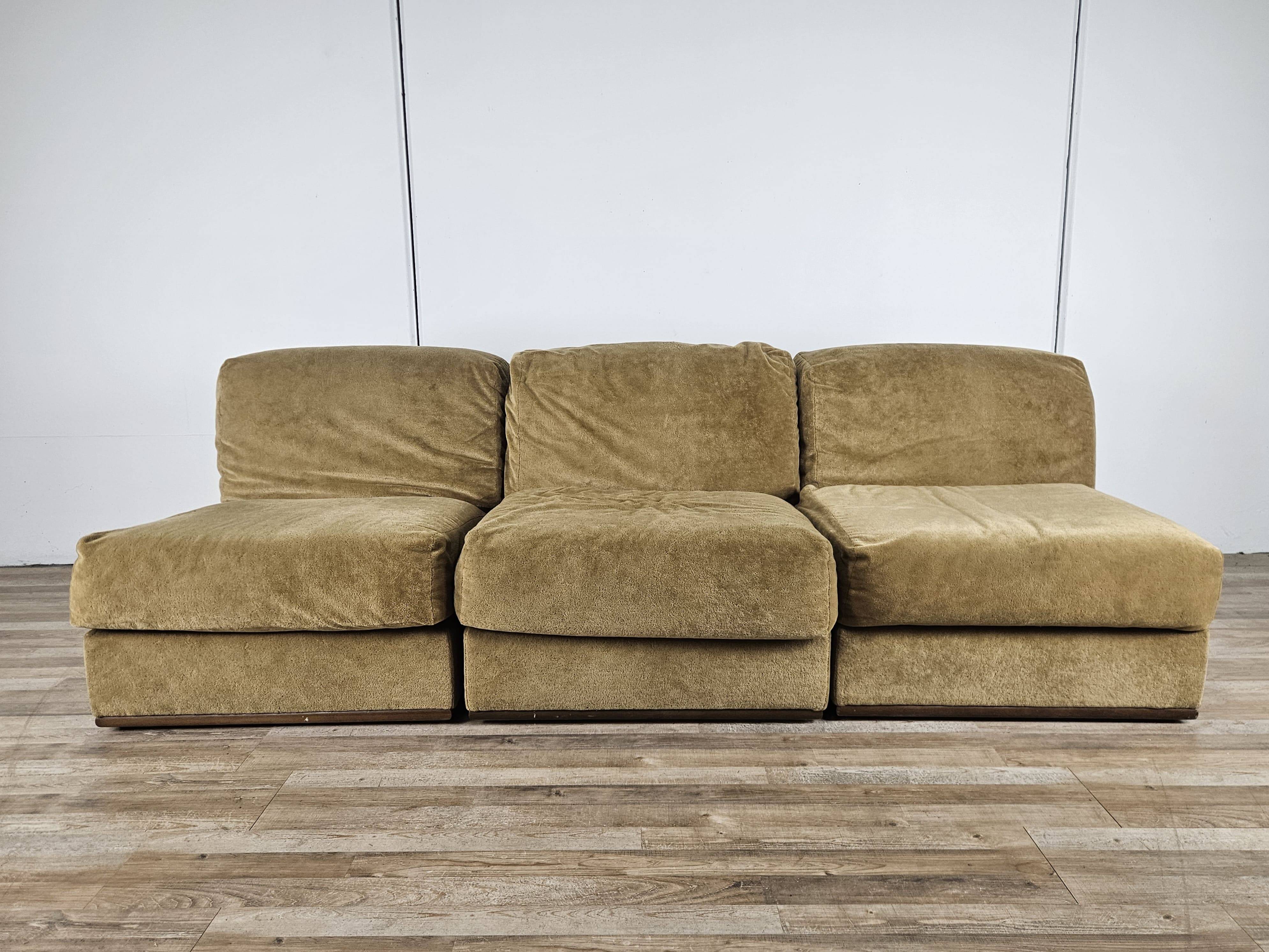 Three fabric lounge chairs 70s