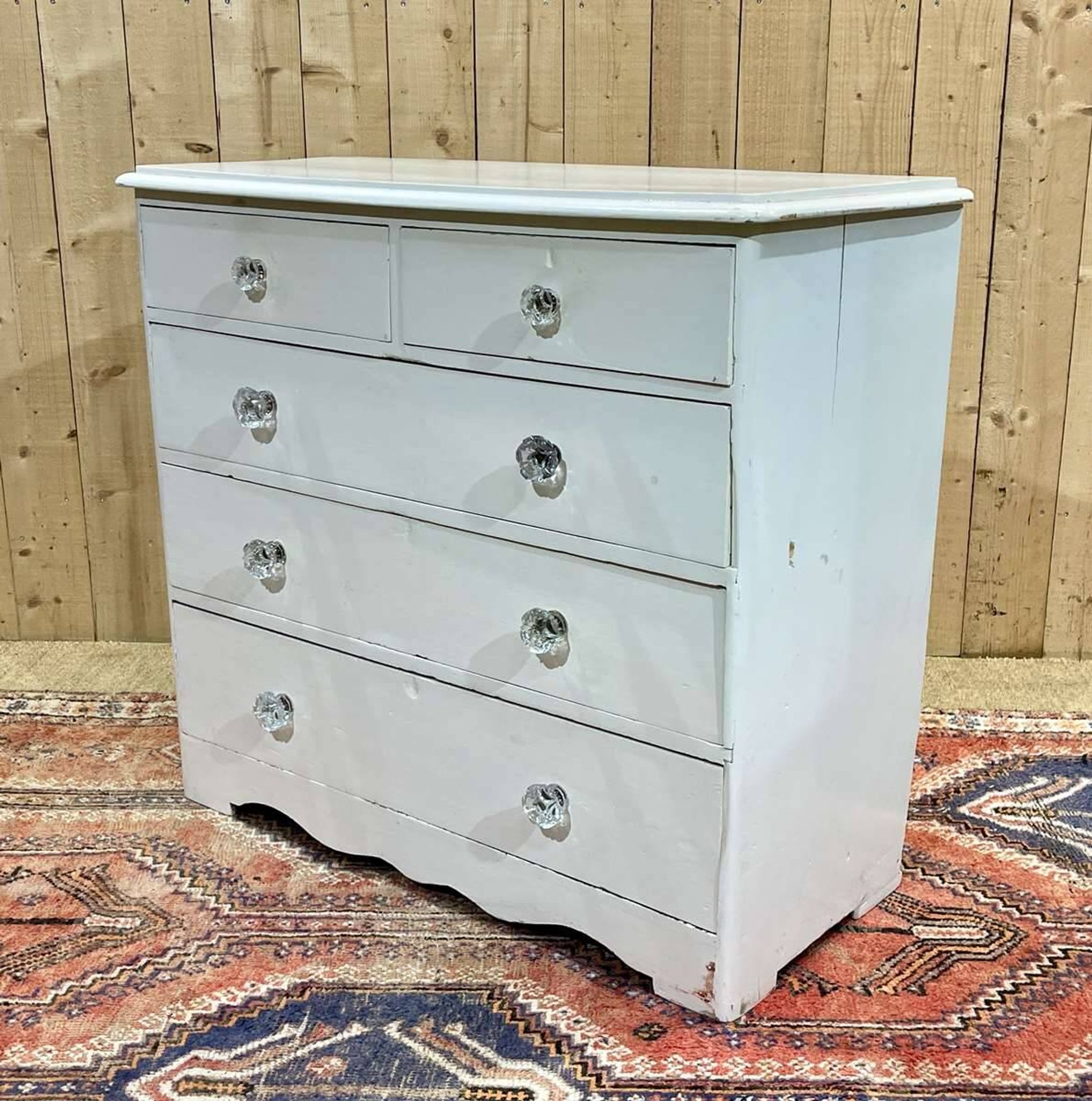 English chest of drawers painted in fir with glass knobs, 19th century