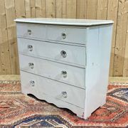 English chest of drawers painted in fir with glass knobs, 19th century