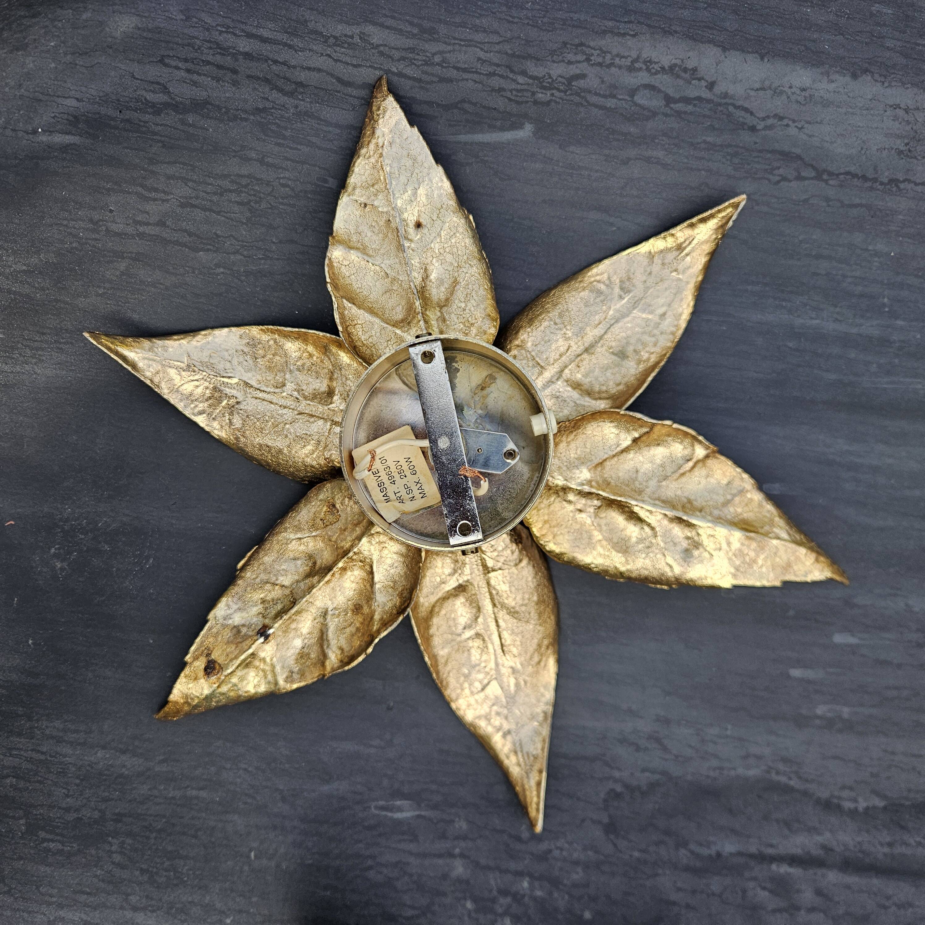 Pair of Massive wall lamps, designed by Willy Daro. 70s