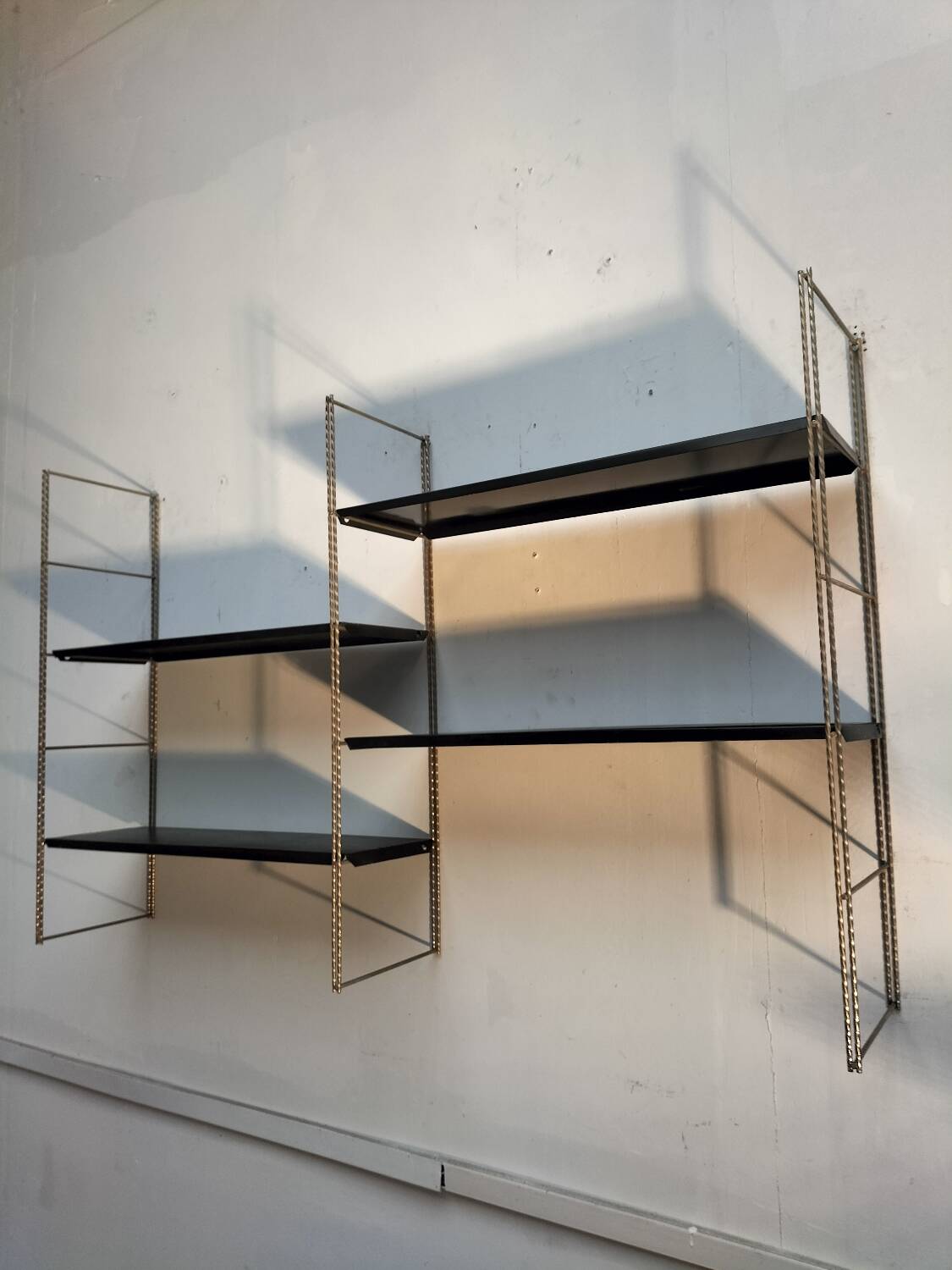 Metal wall shelf