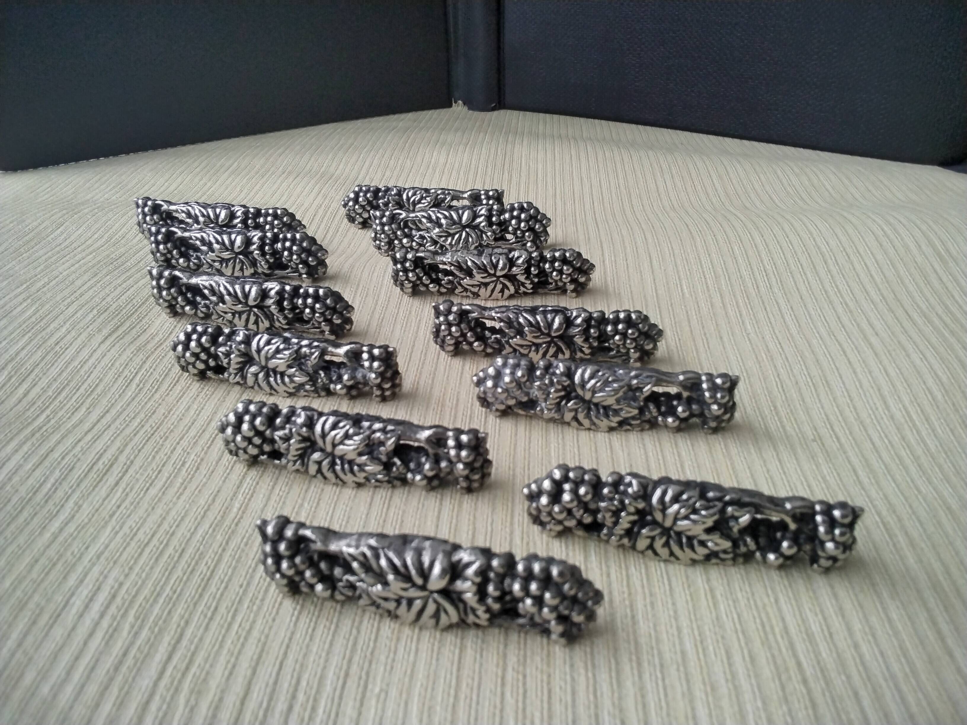 12 Metal knife holders with bunches of grapes and vine leaves