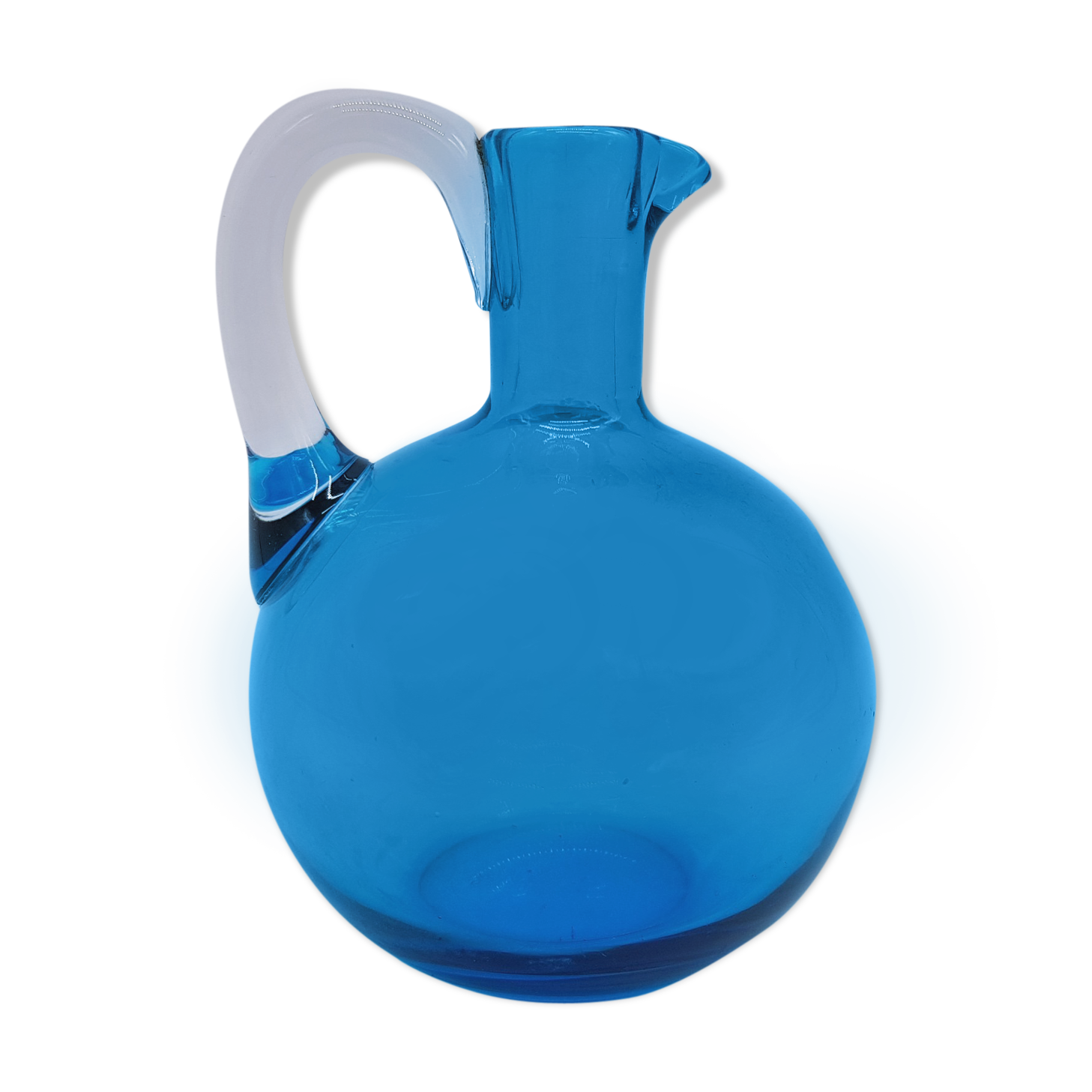 Blue blown glass pitcher