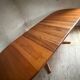 Vintage oval teak Scandinavian table with a central star base from Glostrup.