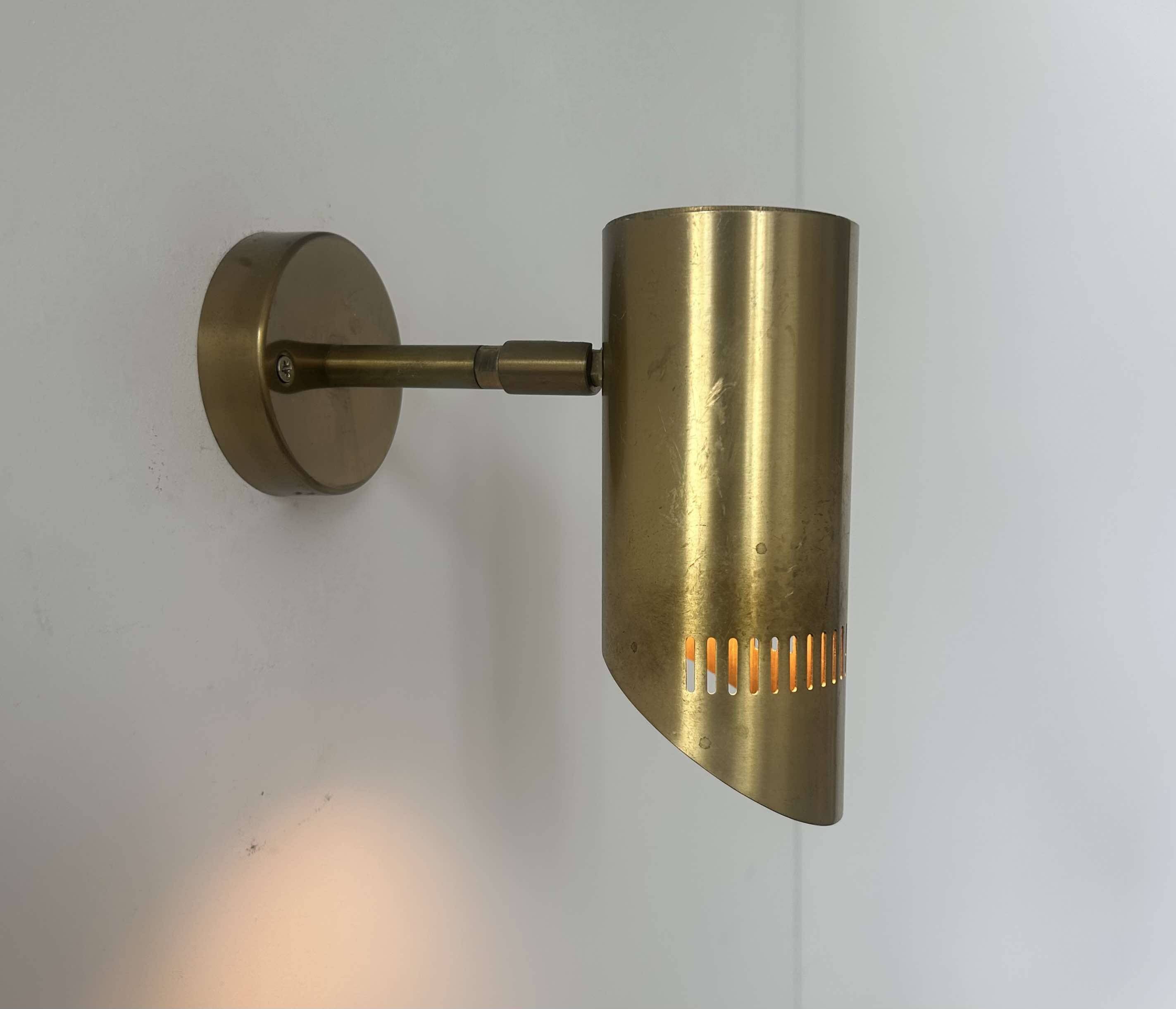 Vintage adjustable wall light, solid perforated brass, France 1960