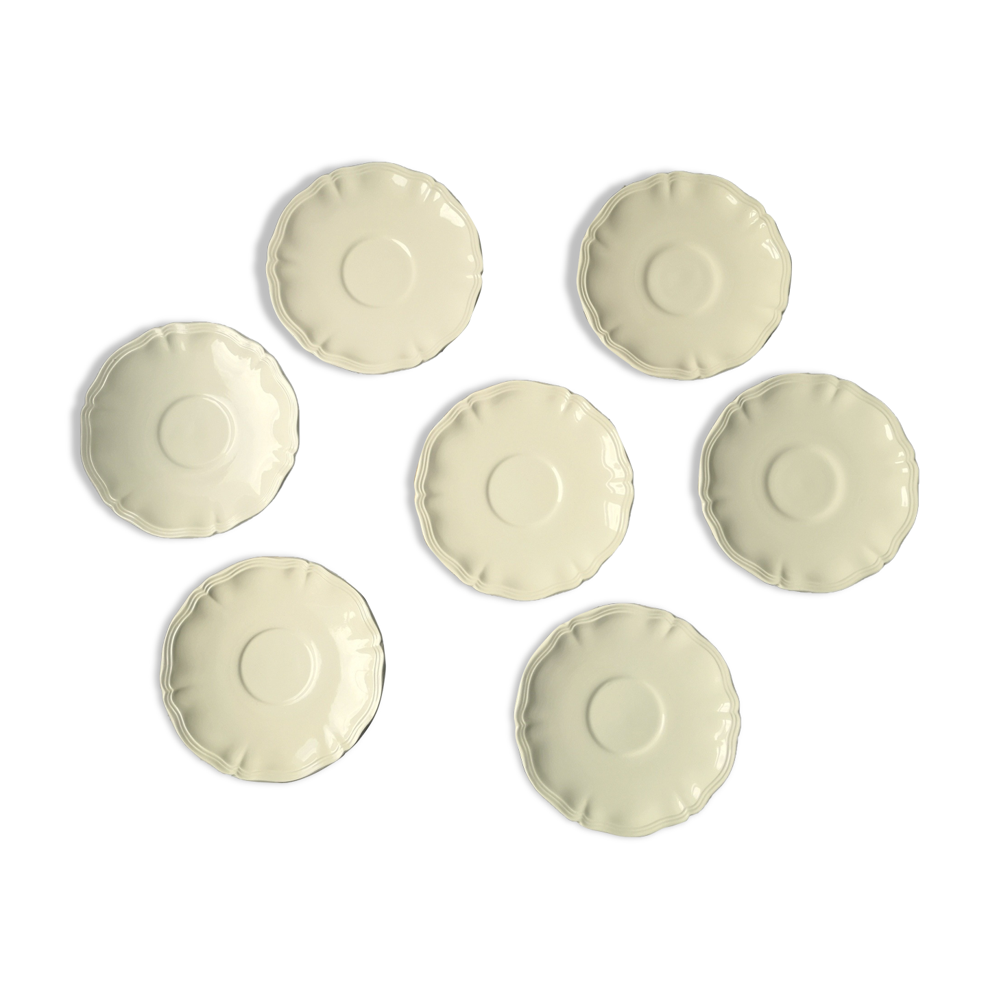 7 large saucers Sarreguemines in off-white faience