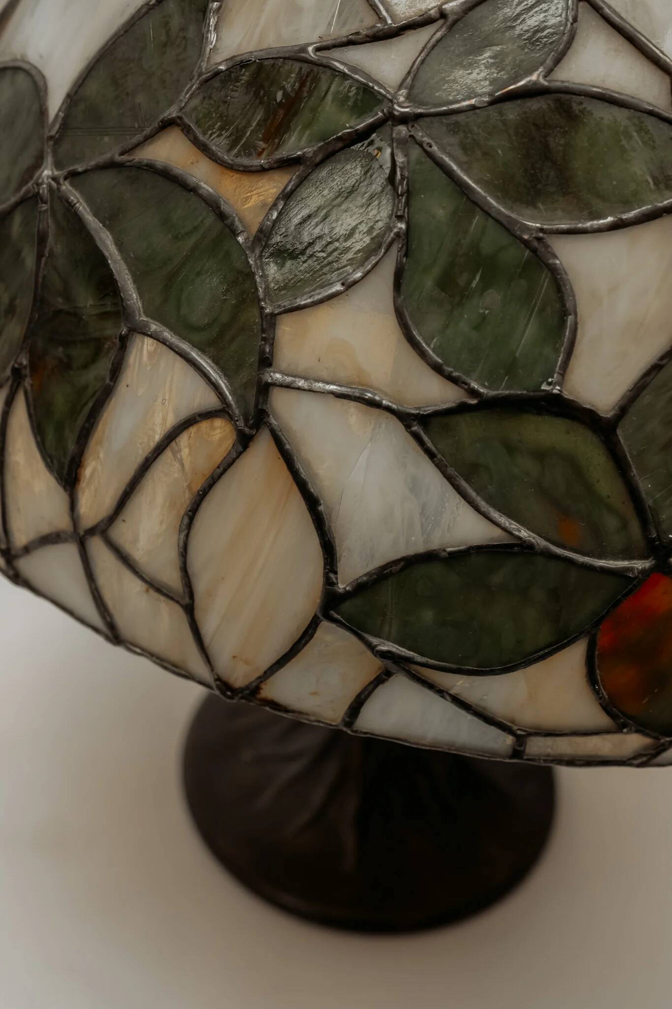 Tiffany-style table lamp with stained glass shade