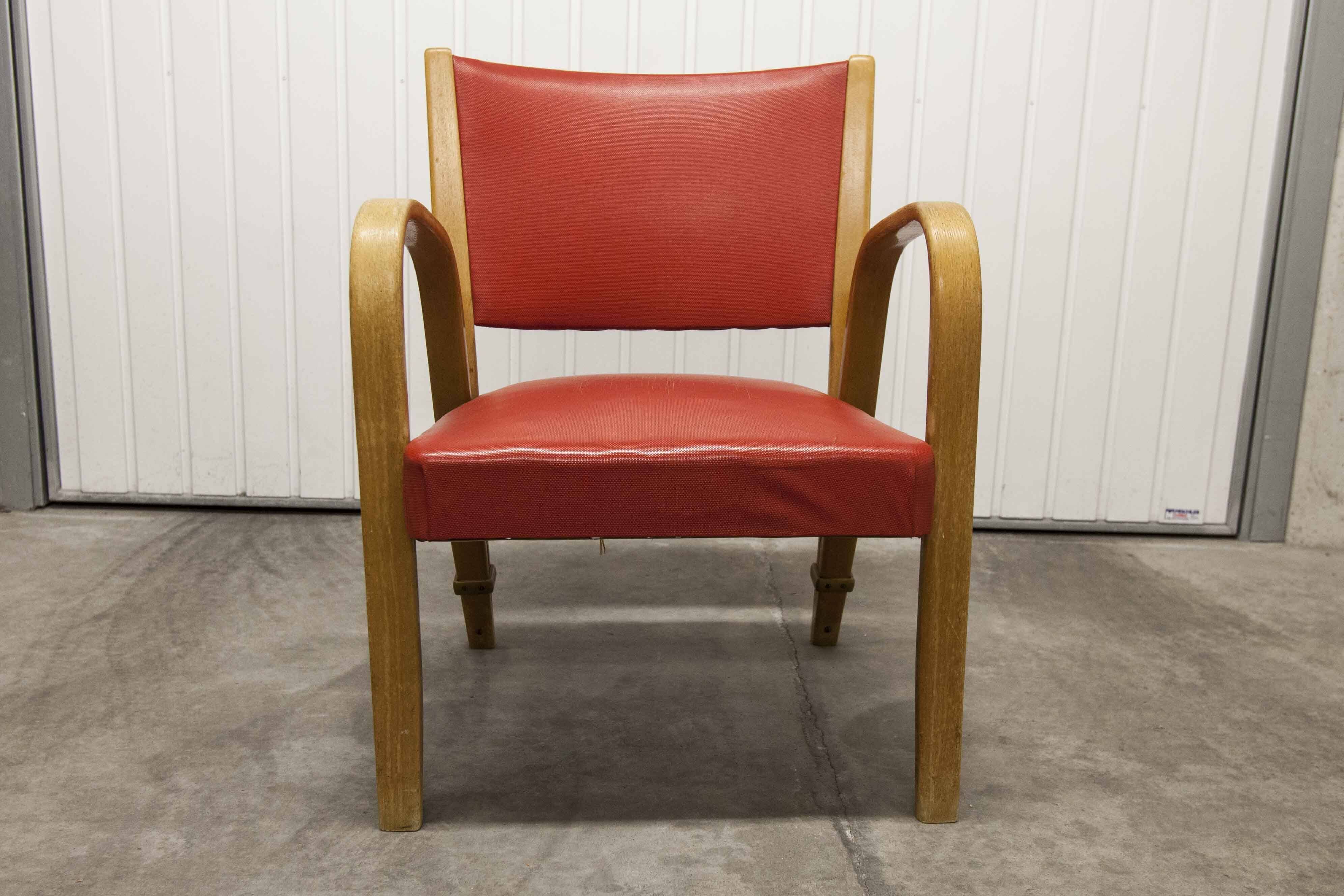 Bow wood armchair by Hugues Steiner 1960 red