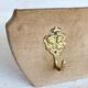 Vintage velvet coat rack with brass hooks