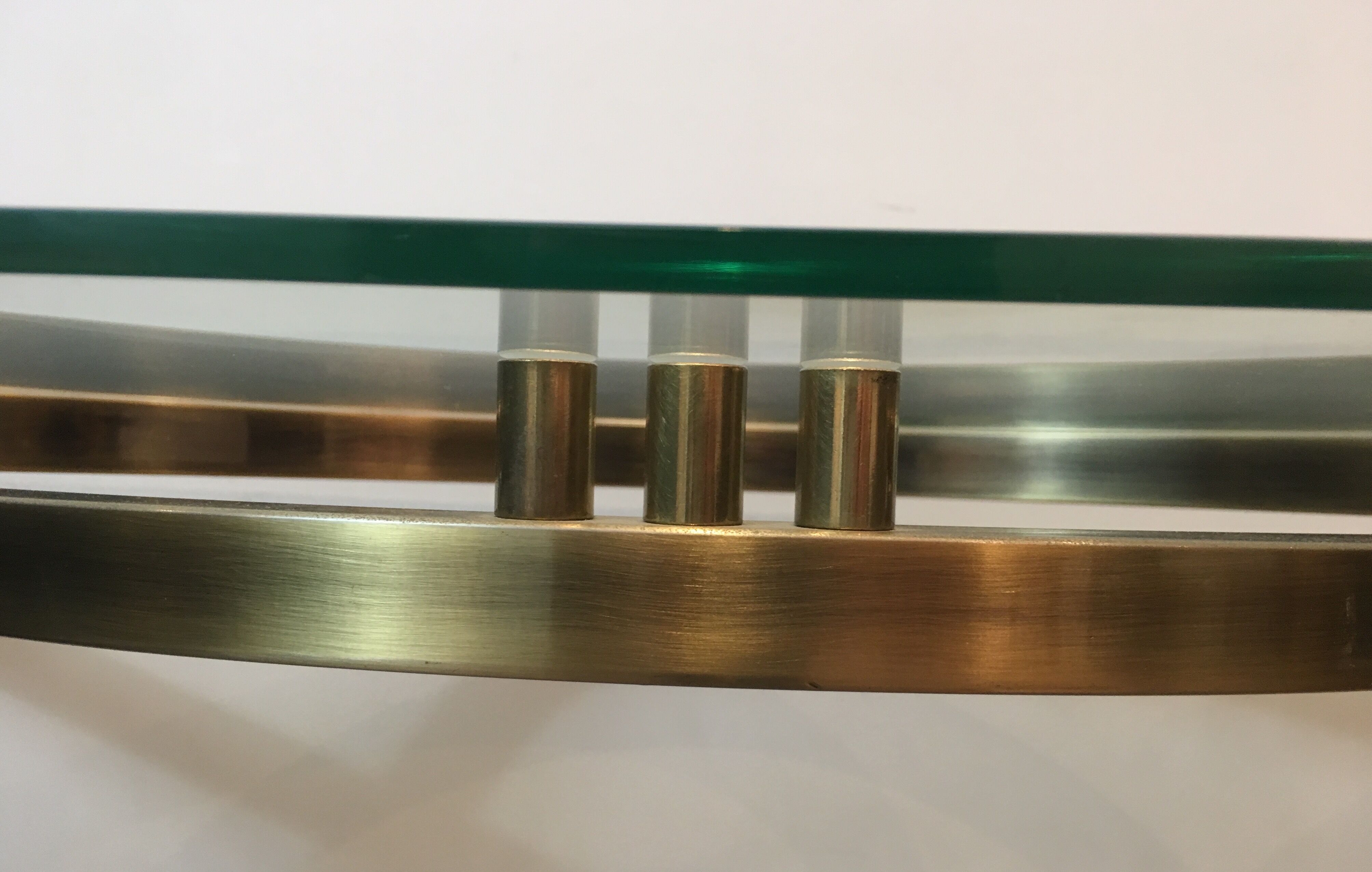 Console in brushed steel and brass and tray formed of a glass slab. French work. Around 1970