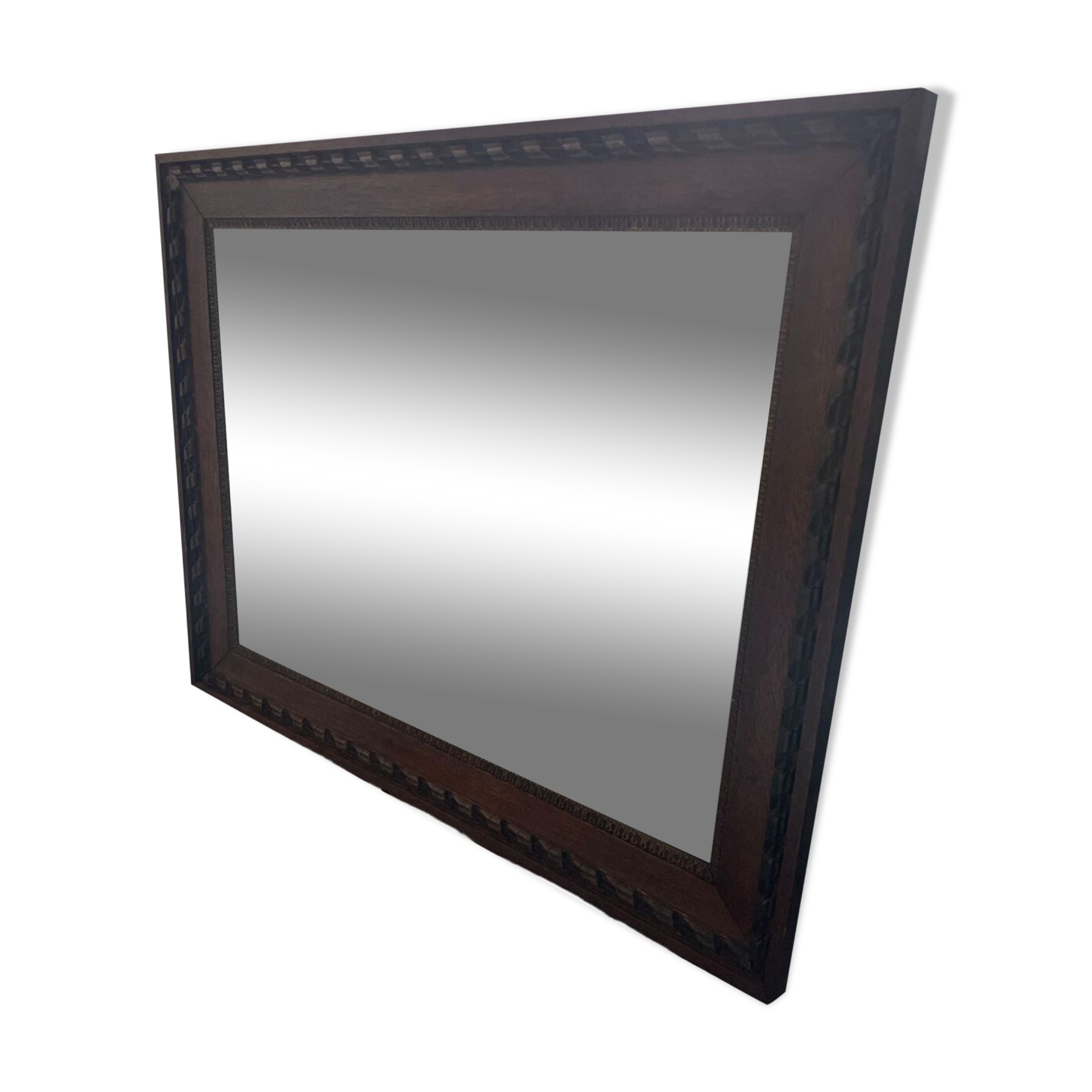 Carved beveled mirror
