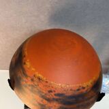 Contemporary mushroom lamp, wrought iron base and shaded orange glass shell