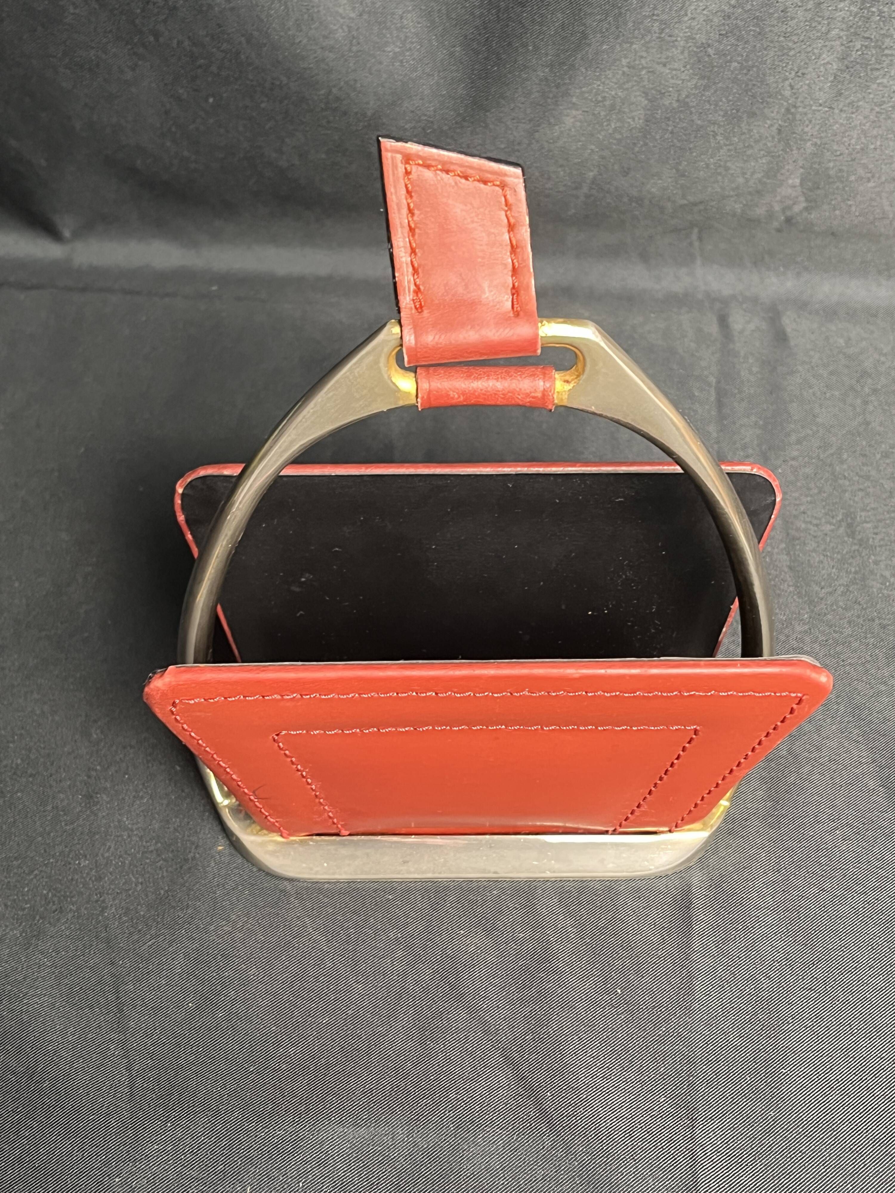 Longchamp, empty pocket document holder with leather and gold metal stirrup from around 1970.