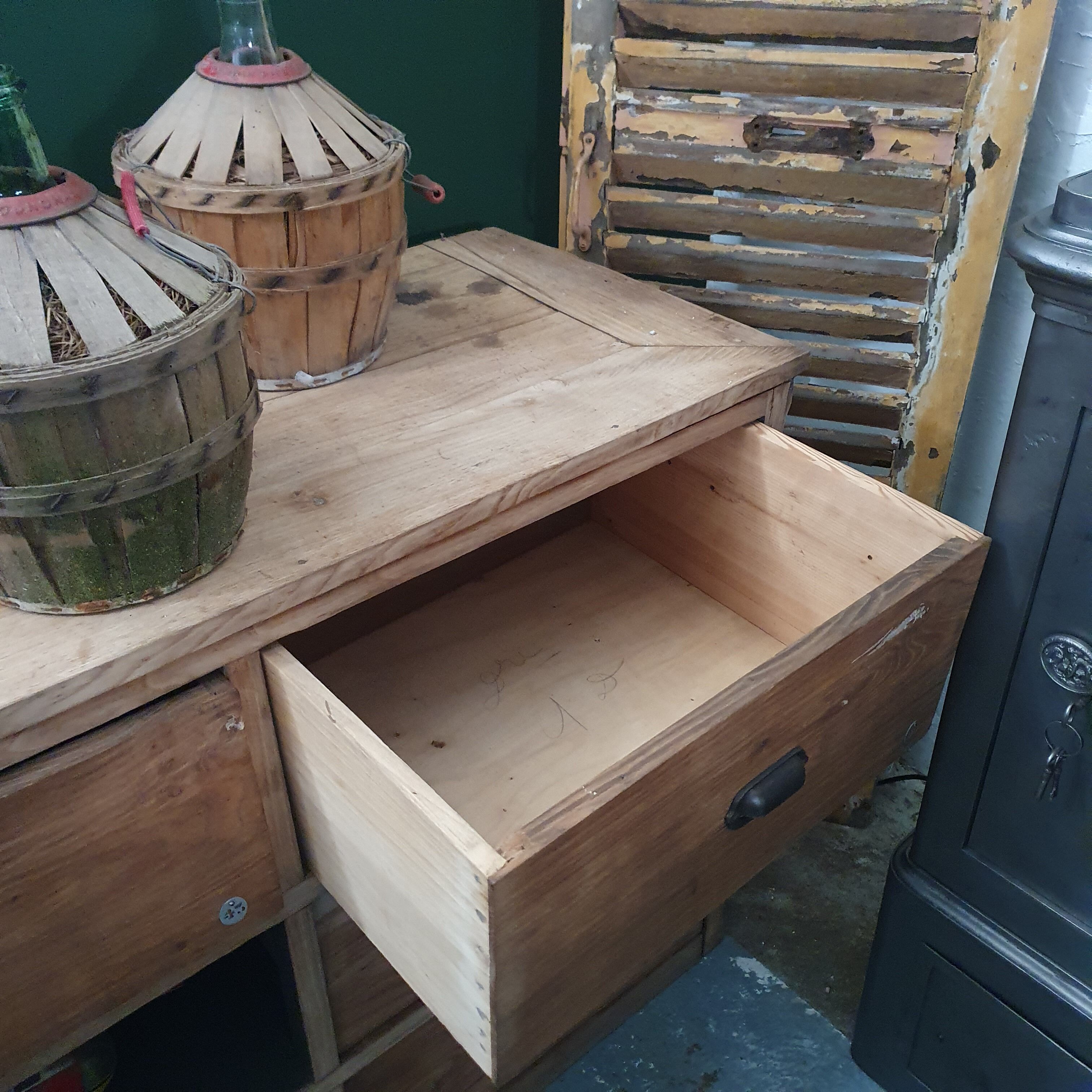 Old piece of trade furniture with chestnut drawer