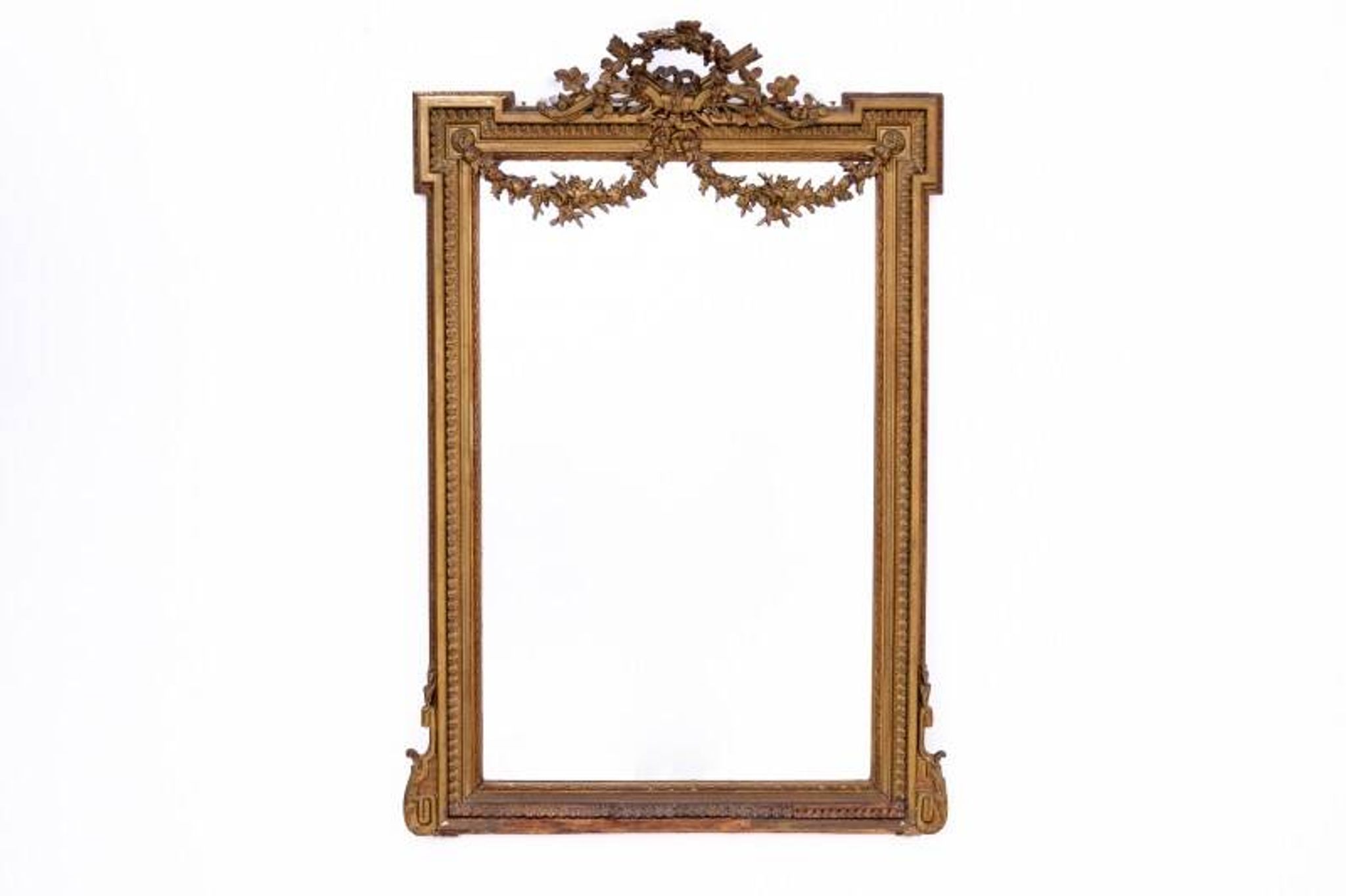 Large mirror in a gold frame, France.
