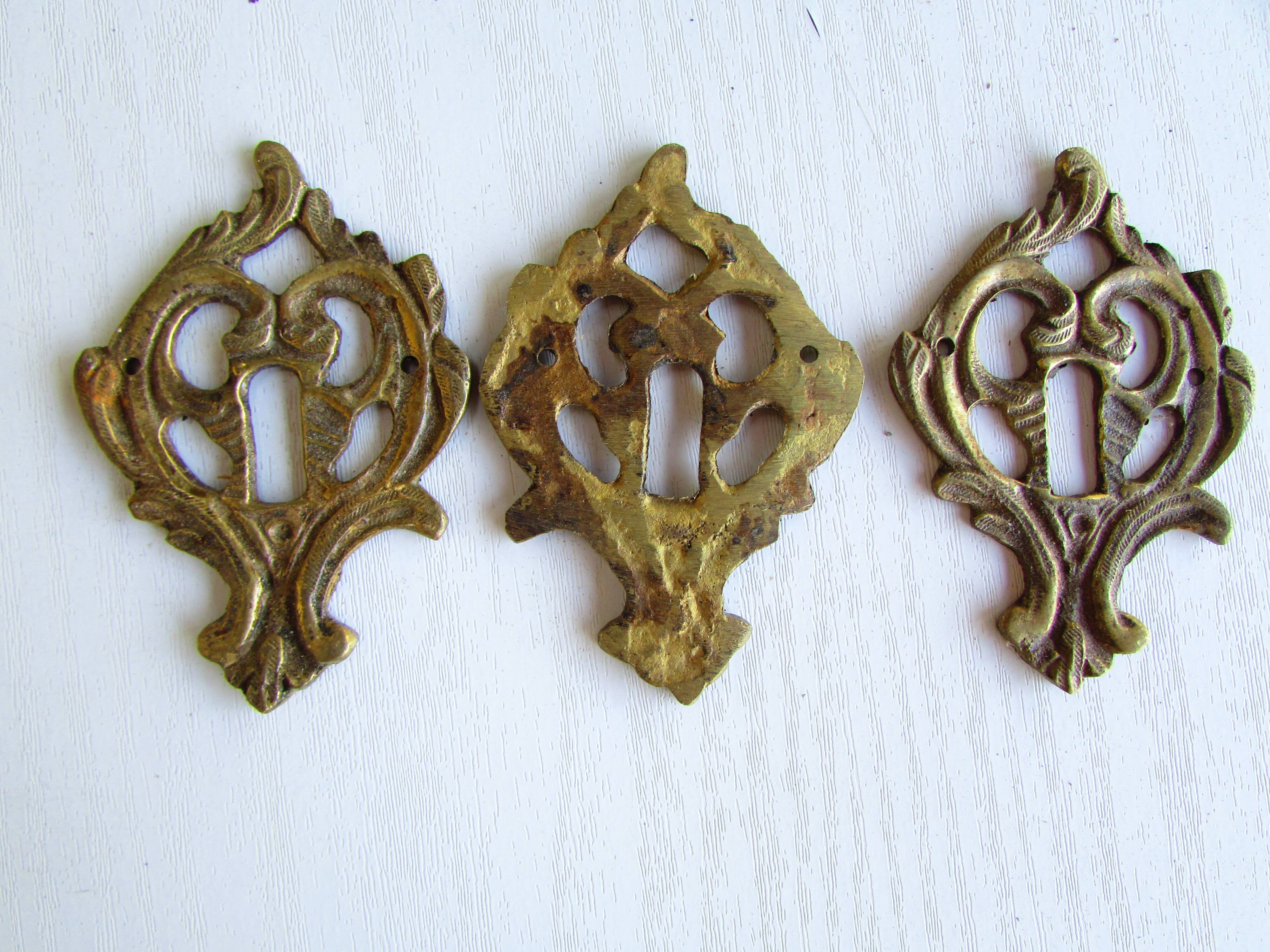 Set of 7 bronze lock entries, for antique furniture