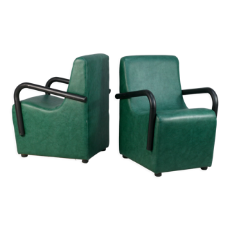 Pair of armrest heaters. Steel and green imitation leather. France, circa 1980