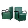 Pair of armrest heaters. Steel and green imitation leather. France, circa 1980