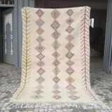 Pastel Béni Ouarain Berber rug with multi-colored Azilal patterns