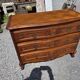 Curved commode in Louis XV style made of cherry wood.