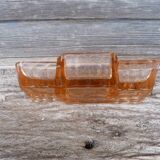 Glass condiment service in transparent pink moulded glass.