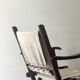 "Safari" folding chair in wood and ecru canvas, 1960s/1970s.
