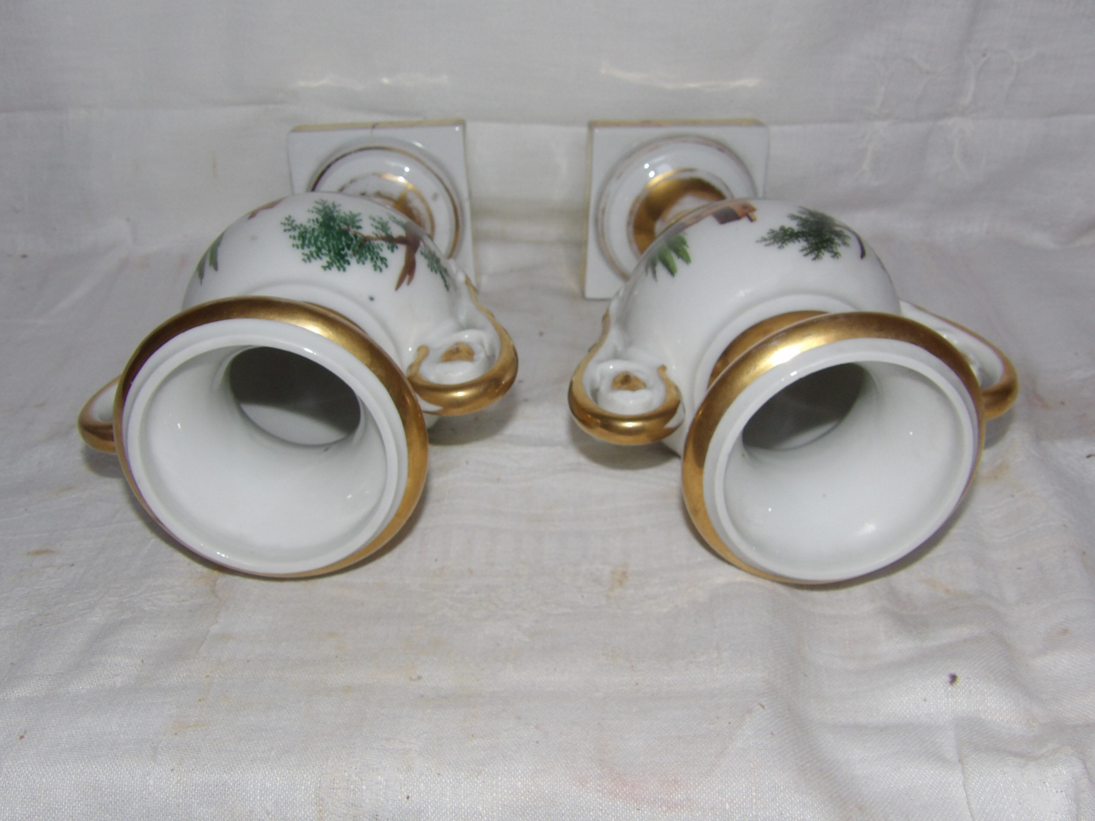 Pair vases porcelain of paris signed PP in hollow decorations turning painted hand gilded handles