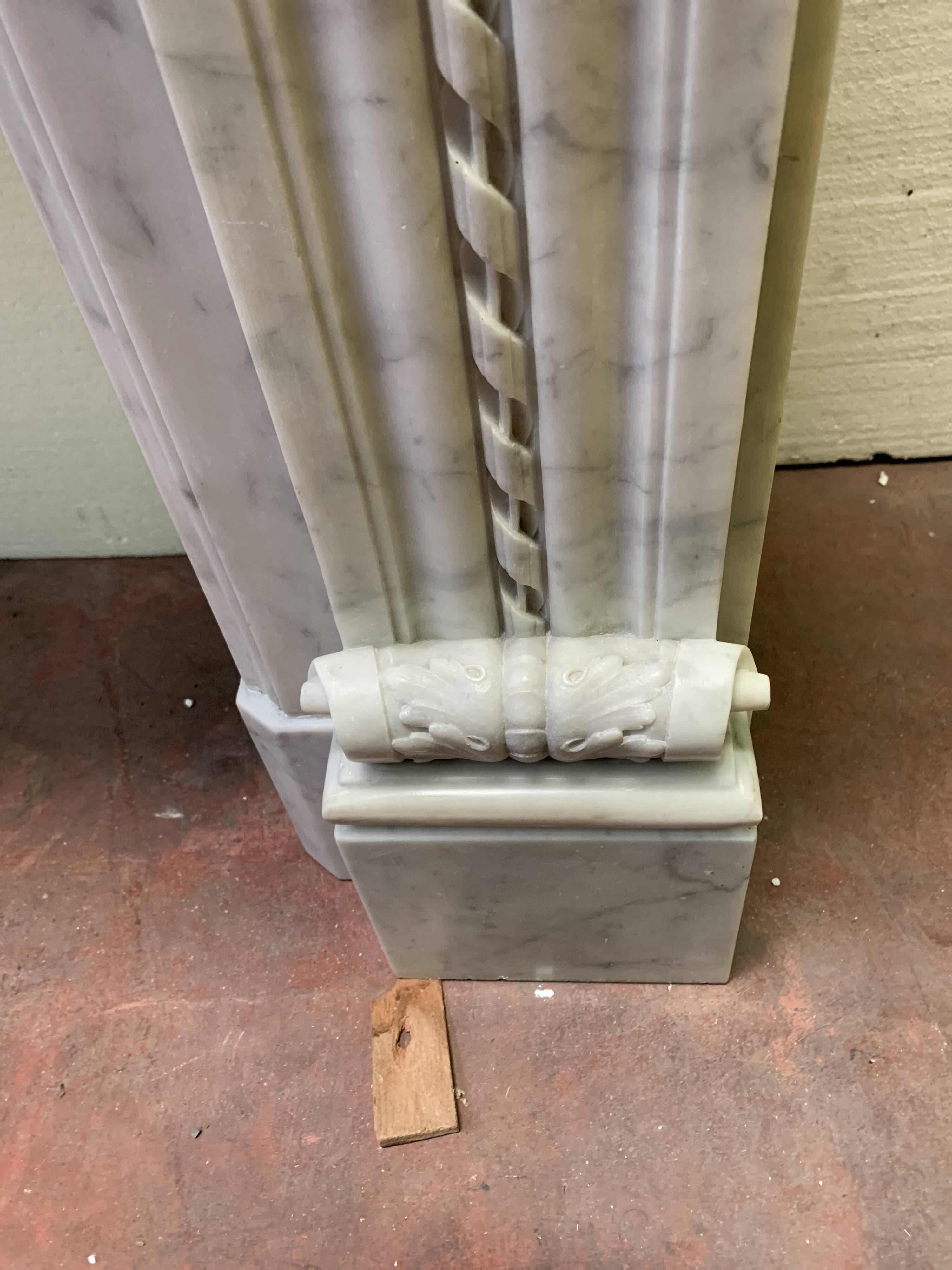 Louis XVI style fireplace in white Carrara marble, 19th century