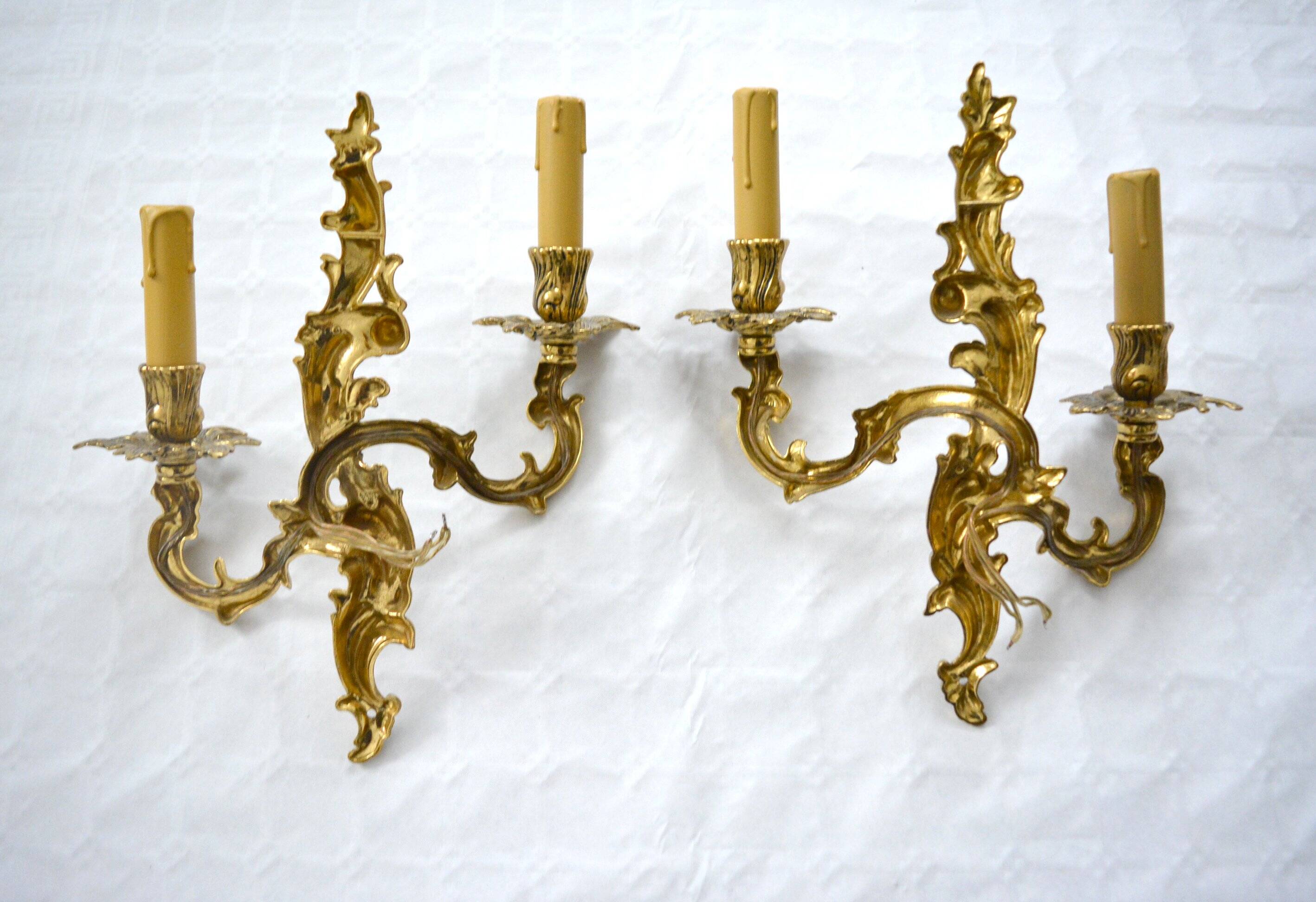 2 brass wall lights with toile de jouy lampshades