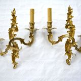 2 brass wall lights with toile de jouy lampshades
