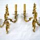 2 brass wall lights with toile de jouy lampshades